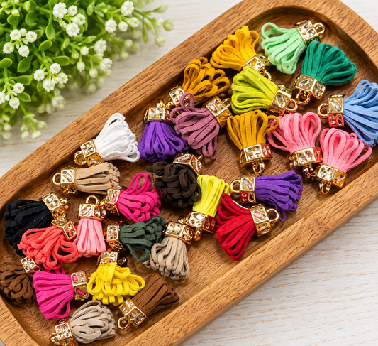 Mixed-color mini faux suede tassel charms in pink, purple, green, yellow, blue and neutral shades for DIY keychains and bag charms