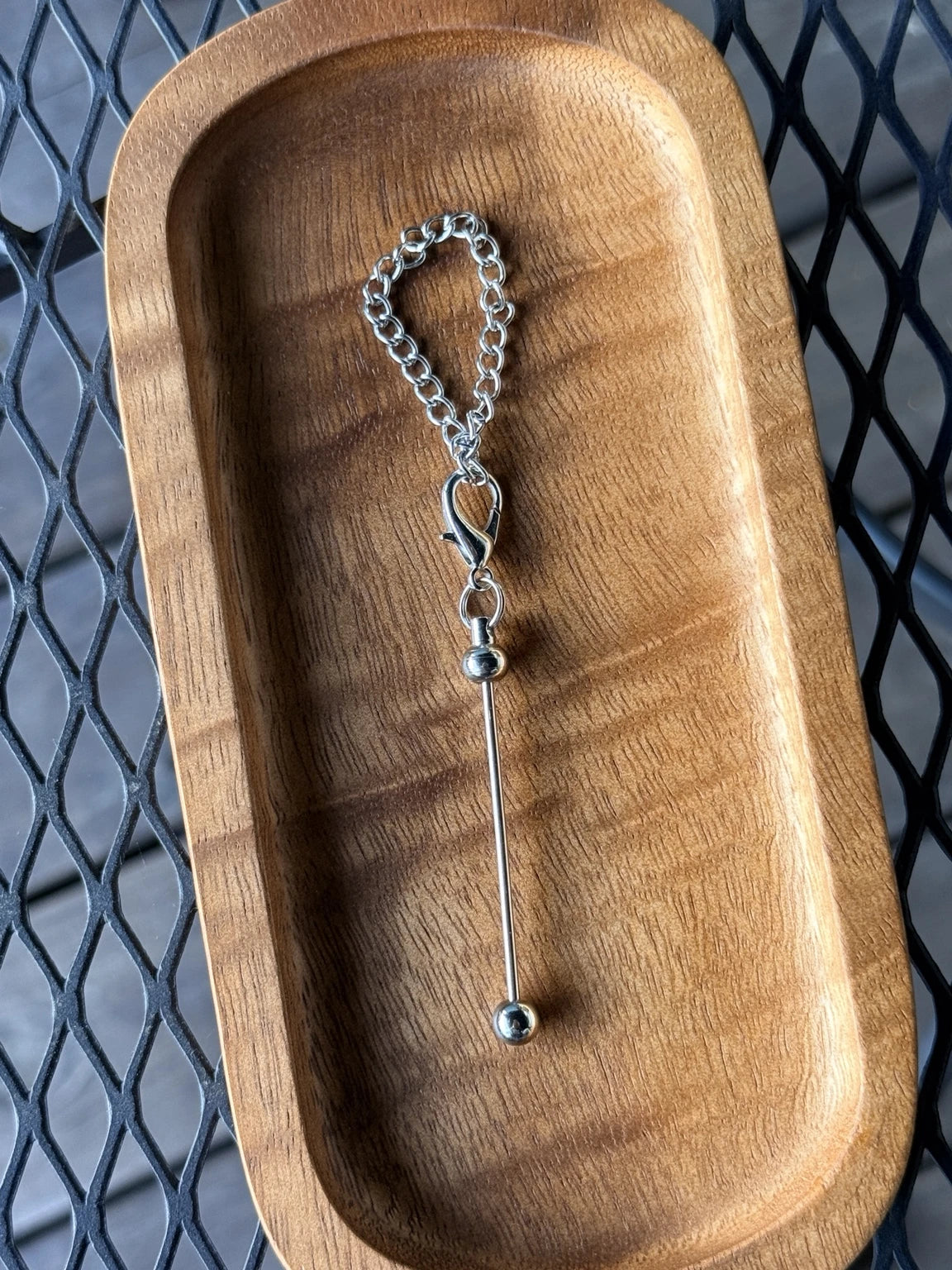 Silver chain beadable straw charm hardware featuring a lobster clasp, decorative chain, and beadable bar, sold in 5-count bags for creating personalized tumbler and drinkware accessories.