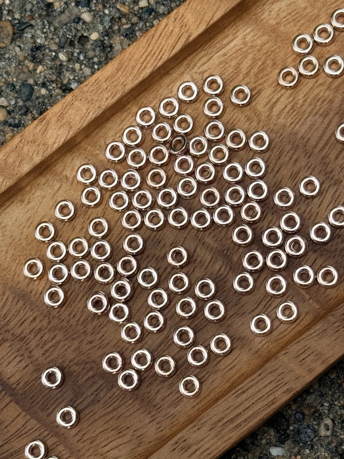 8mm metal ring spacer beads from Four Seasons of Happiness in gold and rose gold finish. Sold in 50-count bags for beadable pens, wristlets, keychains, badge reels, jewelry, and DIY craft projects.