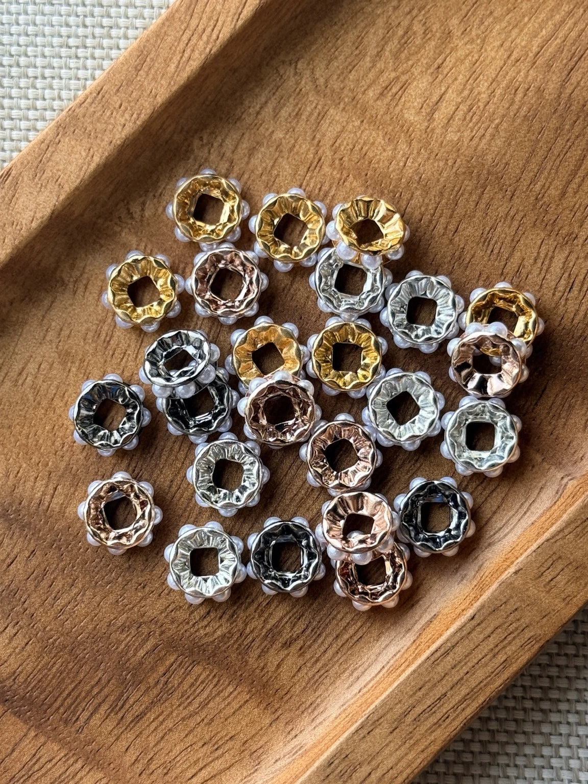 25-count mix of 10mm neutral pearl wide mouth spacer beads in gold, silver, rose gold and gunmetal tones for beadable pens, keychains, wristlets and DIY crafts.