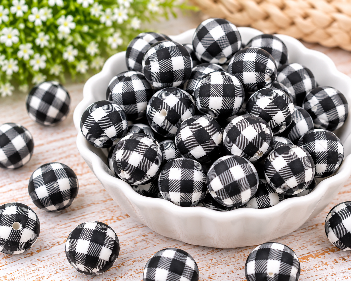 Black and white buffalo plaid silicone beads for handmade wristlet keychains, bag charms, and DIY beading projects.