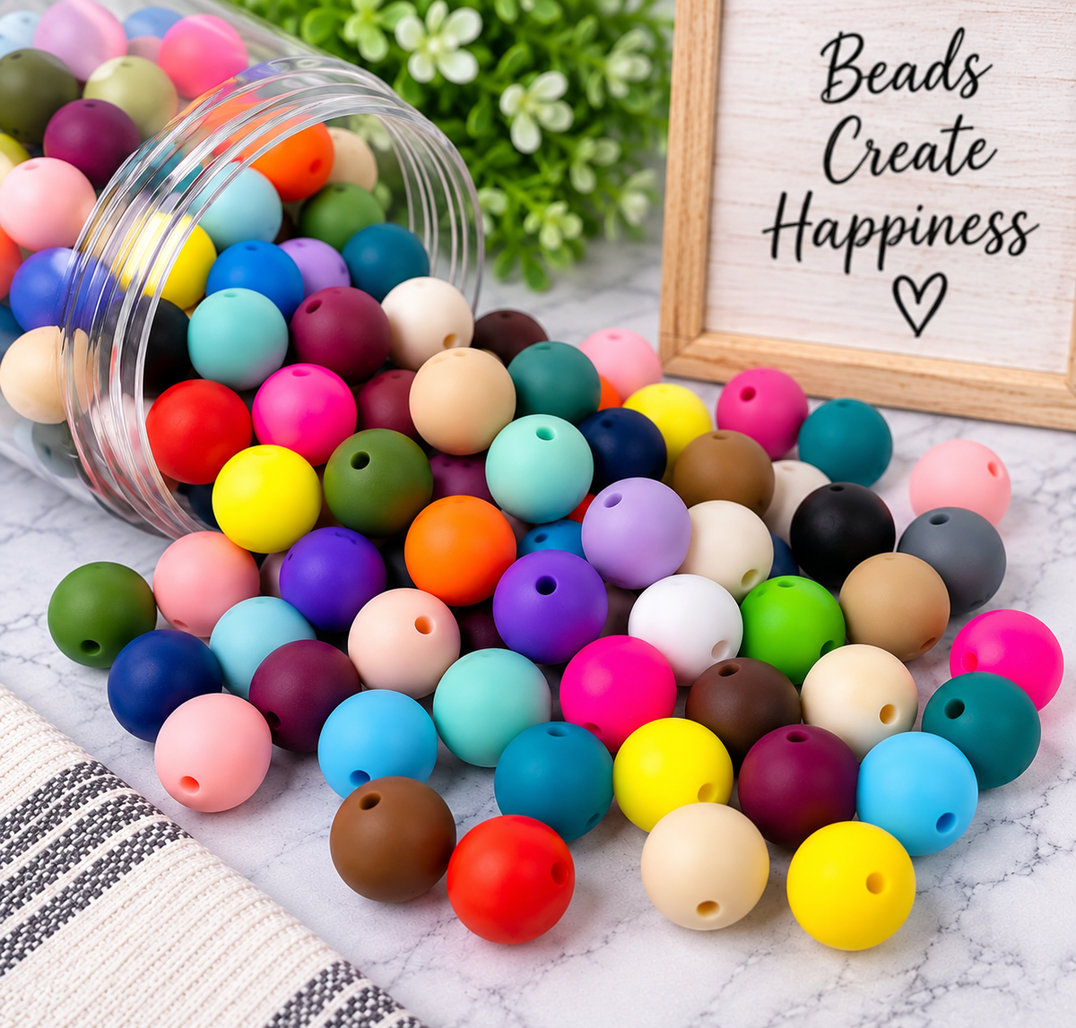 Mixed assortment of colorful 15mm round silicone beads available in 120, 240 and 500-count bulk bags from Four Seasons of Happiness.