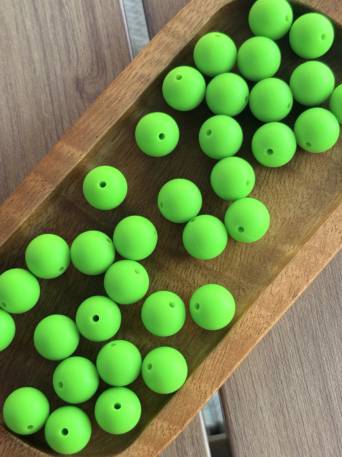     15mm Electric Lime silicone round beads featuring a vibrant neon green matte finish for DIY keychains, wristlets, beadable pens, badge reels, and handmade craft projects.