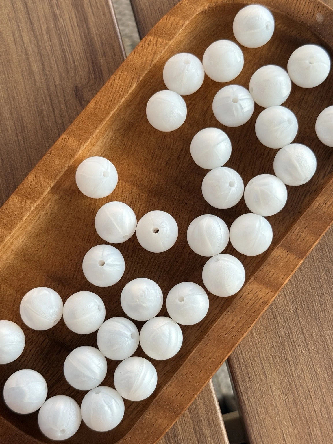     15mm Pearl Promenade silicone round beads featuring a pearl white finish for DIY keychains, wristlets, beadable pens, badge reels, bridal accessories, and handmade craft projects.