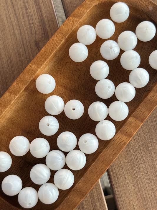     15mm Pearl Promenade silicone round beads featuring a pearl white finish for DIY keychains, wristlets, beadable pens, badge reels, bridal accessories, and handmade craft projects.