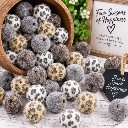 Assorted 16mm fuzzy animal print beads featuring leopard-inspired patterns and coordinating neutral colors, sold in 10-count mixed bags by FSOH.