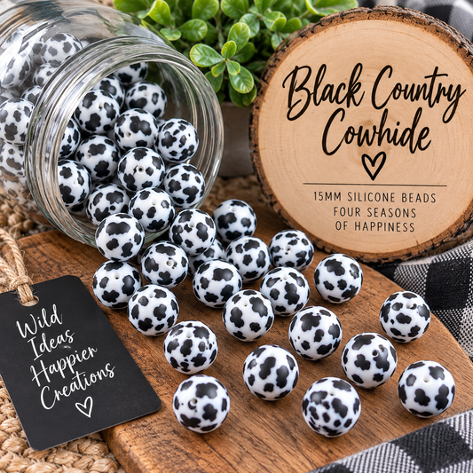 Black Country Cowhide 15mm printed silicone beads featuring a black and white cow print, perfect for western-inspired bead crafts, wristlets and keychains.