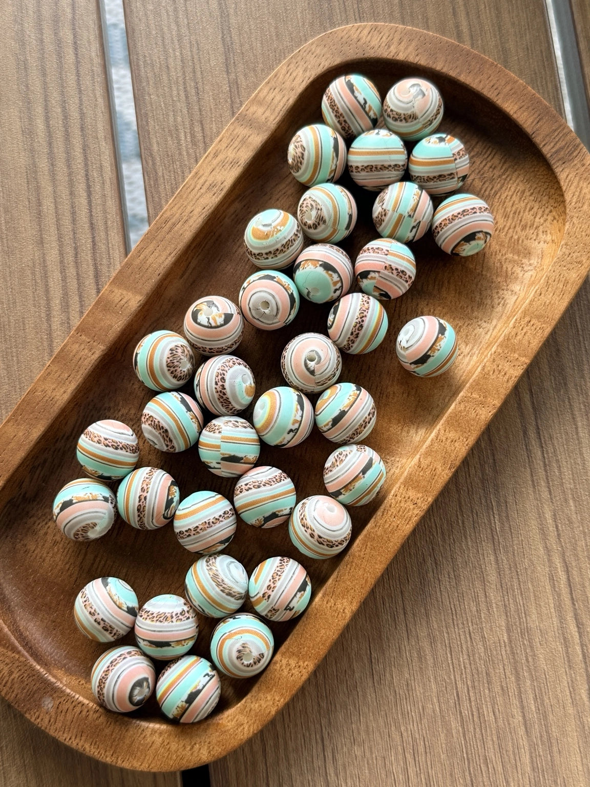     15mm printed silicone beads featuring blush pink, turquoise, cream, caramel, and leopard-inspired western boutique patterns, perfect for beadable pens, wristlets, keychains, badge reels, and DIY craft projects.