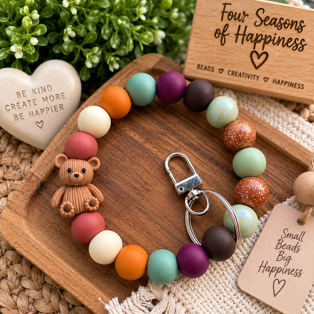 Cozy Little Moments teddy bear wristlet featuring 17 colorful 15mm silicone beads, textured bear focal and silver swivel clasp keychain by FSOH.