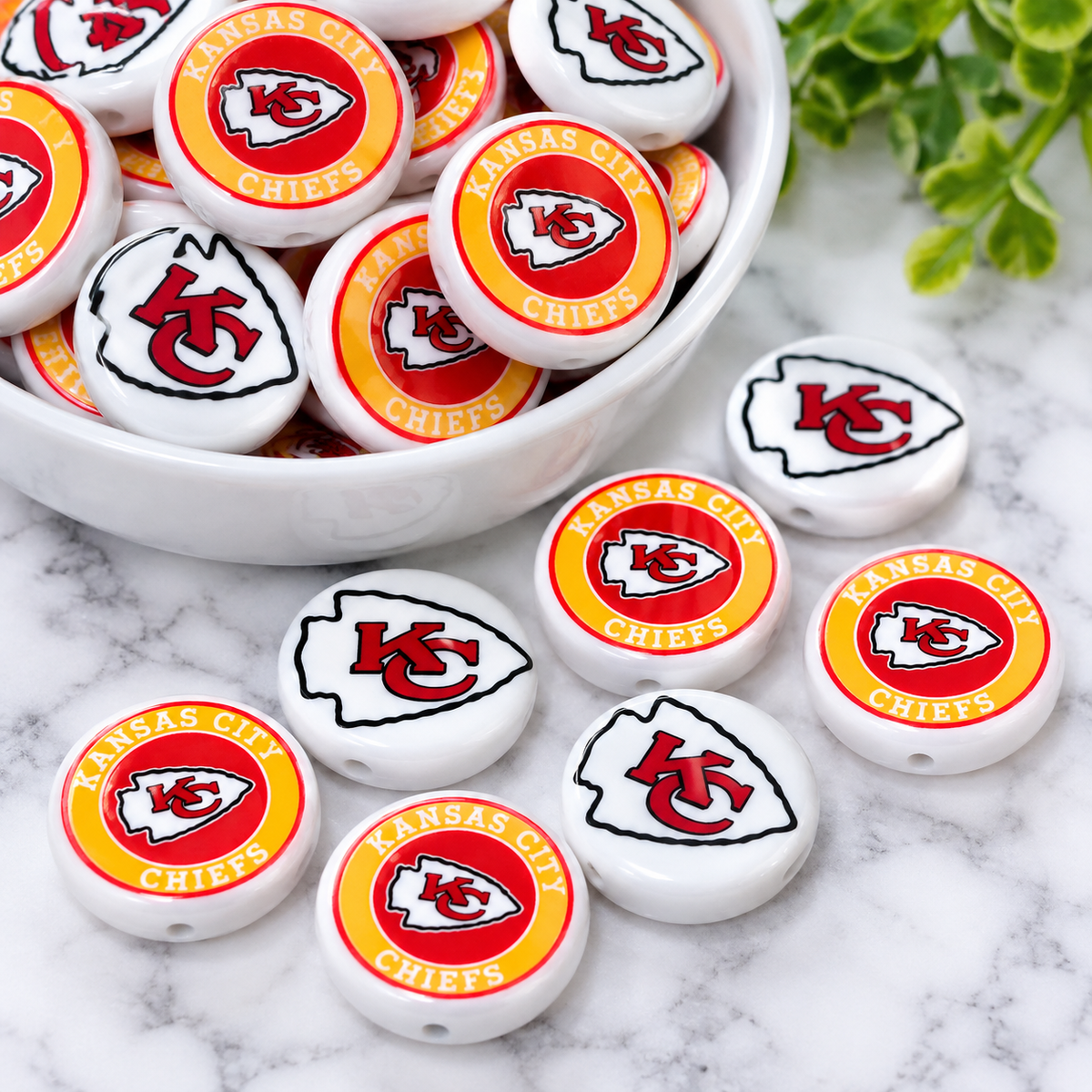 football acrylic focal beads in a variety of sports-inspired designs. Sold individually for wristlets, keychains, bag charms and DIY crafts.