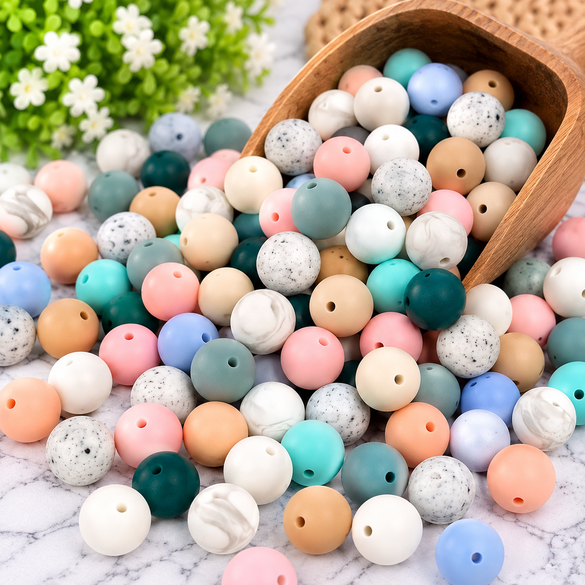 Assorted 19mm silicone beads in a variety of colors and styles from the Happy Little Scoop 50-count random bead mix.