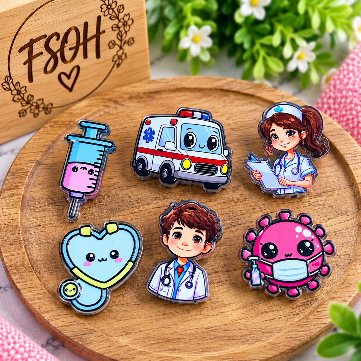 Healthcare-themed acrylic focal bead assortment featuring nurse, doctor, ambulance, syringe and stethoscope designs, sold in random 6-count bags.