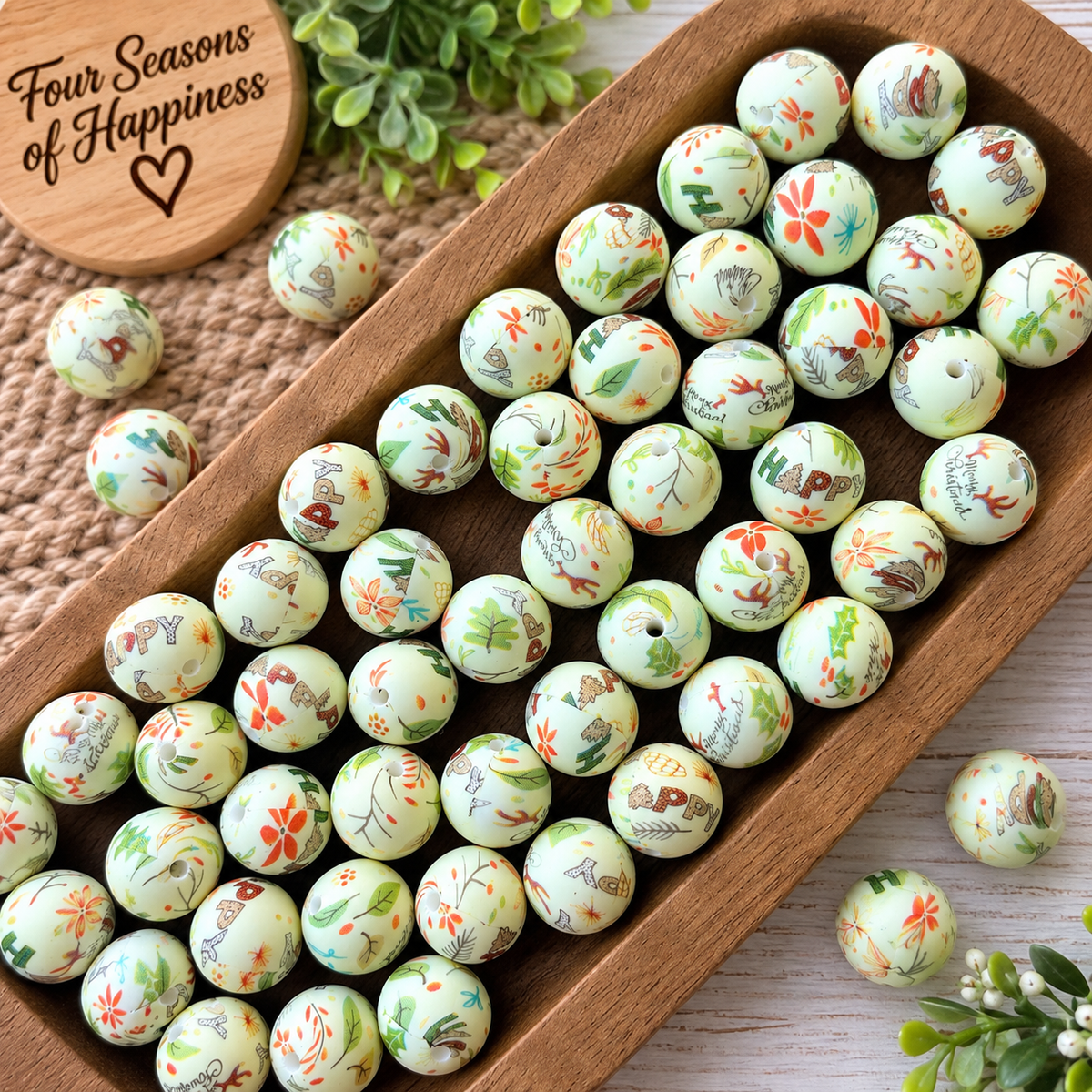 Merry Christmas Garden 15mm printed silicone bead with a light mint background, colorful Christmas botanical details and Merry Christmas print.