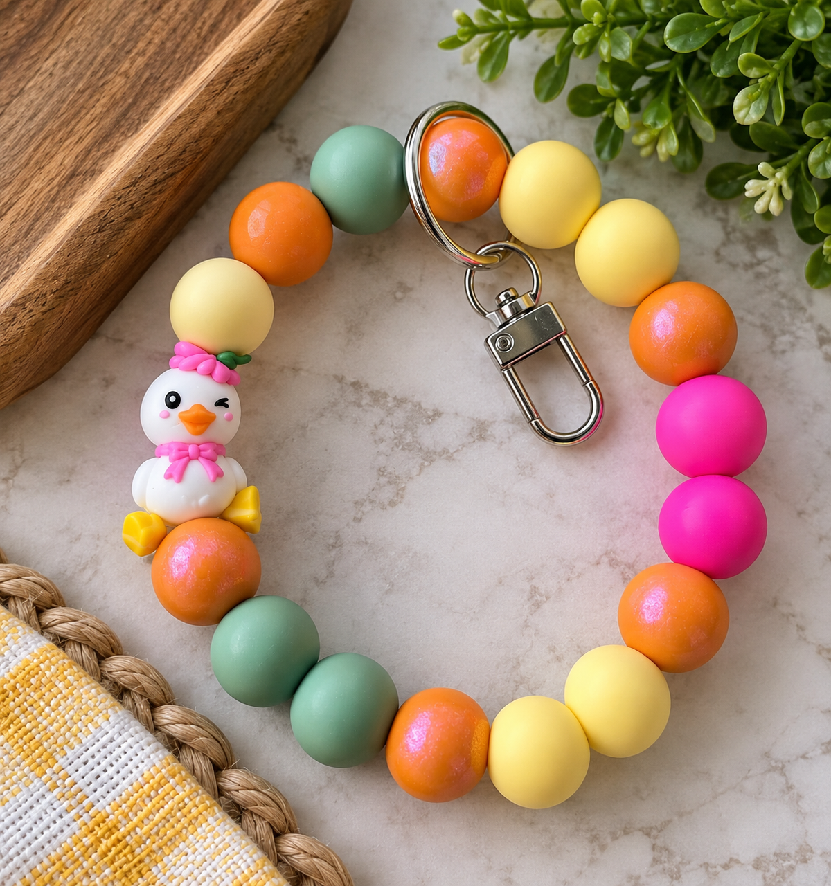 Penelope’s Happy Little Moment duck wristlet featuring 16 colorful 15mm silicone beads, duck focal and silver swivel clasp keychain by FSOH.