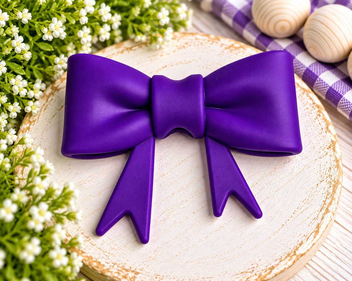 Royal Amethyst deep purple large silicone bow focal bead for wristlets, bag charms, cup charms, keychains and DIY beading projects.