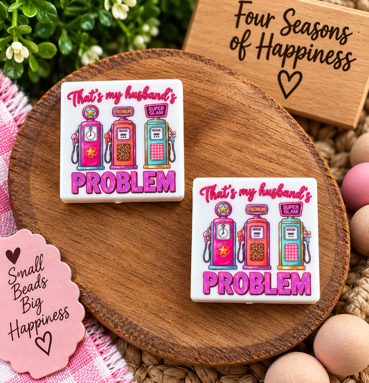 That’s My Husband’s Problem silicone focal bead with colorful pink, orange and teal retro gas pumps for wristlets, keychains and beadable crafts.