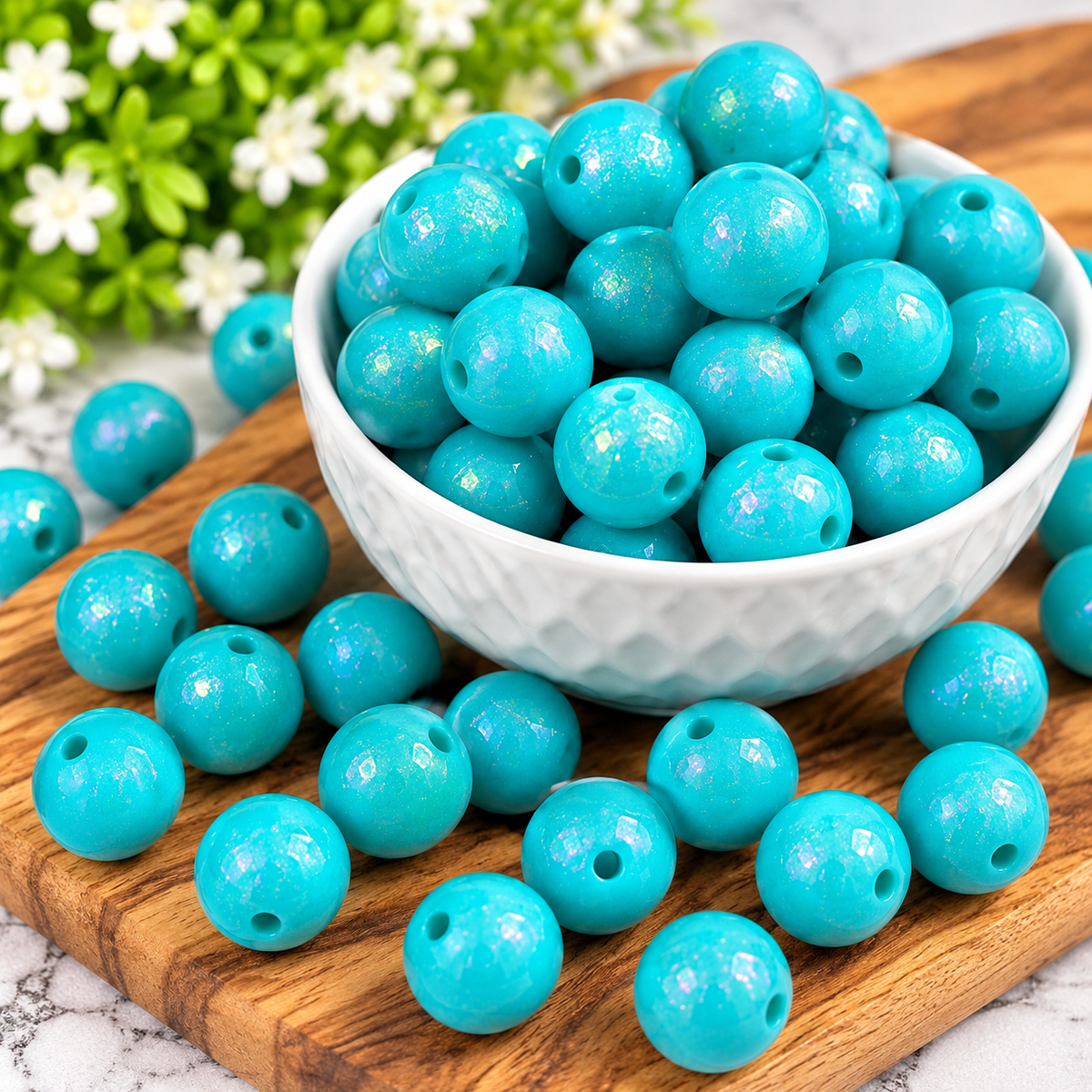 Tropical Lagoon Opal 15mm turquoise silicone beads with a luminous opal finish displayed on a wooden tray.