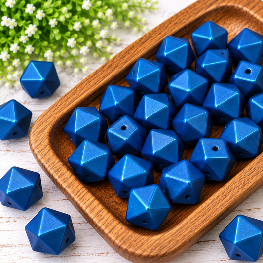 Blue Horizon 14mm metallic silicone hexagon beads with subtle green undertones displayed in a wooden tray