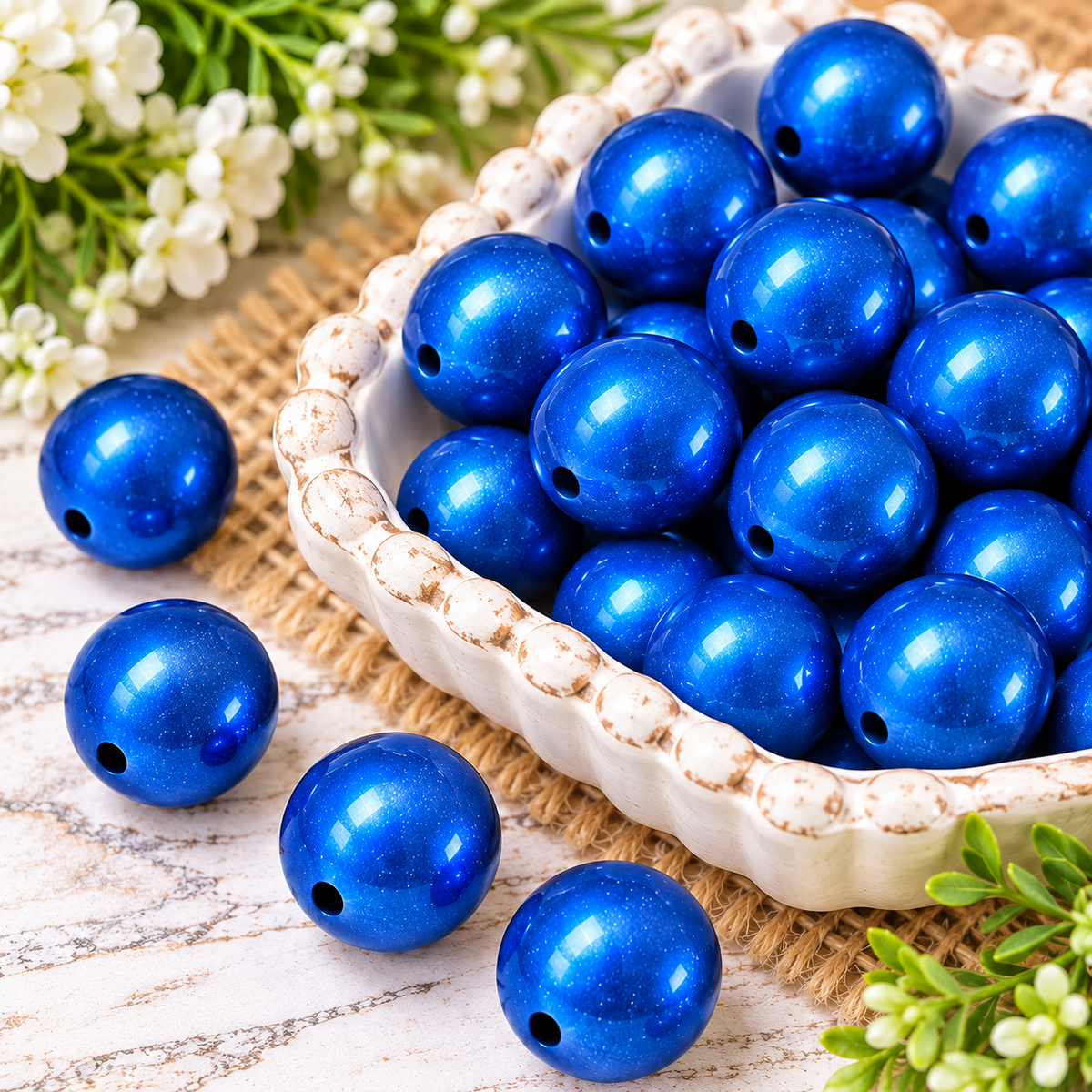 Blue Horizon 15mm metallic silicone round beads in a rich shimmering blue displayed together