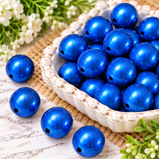 Blue Horizon 15mm metallic silicone round beads in a rich shimmering blue displayed together