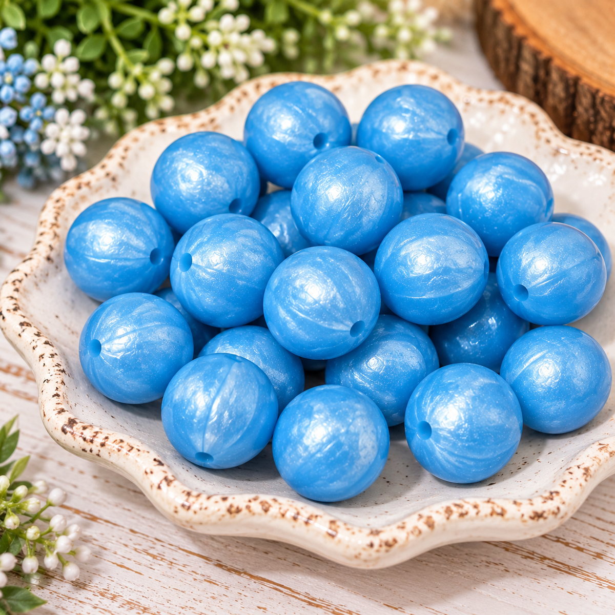 Blue Skies & Pearly Wishes 15mm sky-blue pearlescent silicone beads with a glossy pearl-like shimmer and subtle swirled texture for DIY beaded pens, wristlets and keychains.