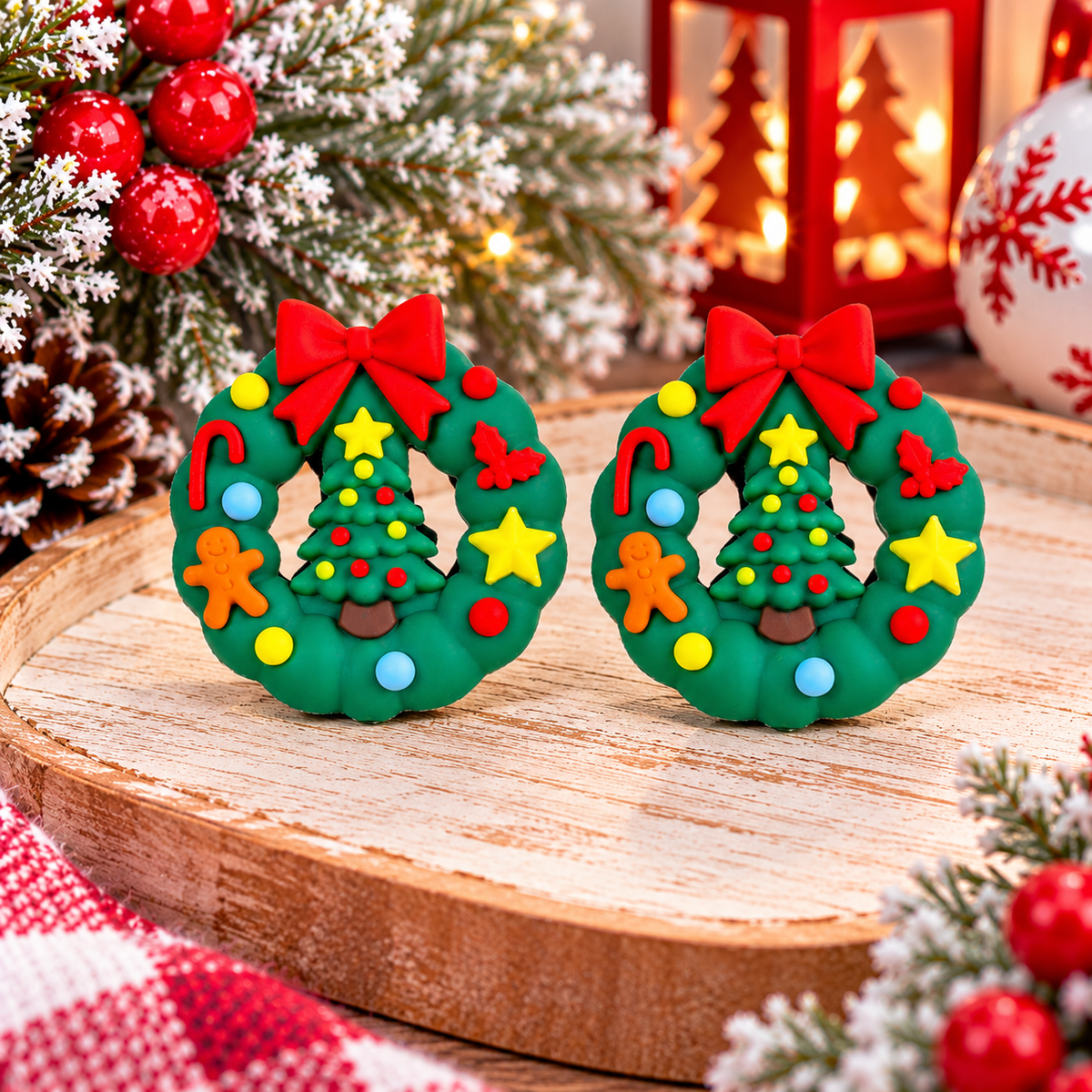 Christmas wreath silicone focal bead with red bow, decorated Christmas tree, candy cane, gingerbread man, and colorful holiday accents for DIY crafts.