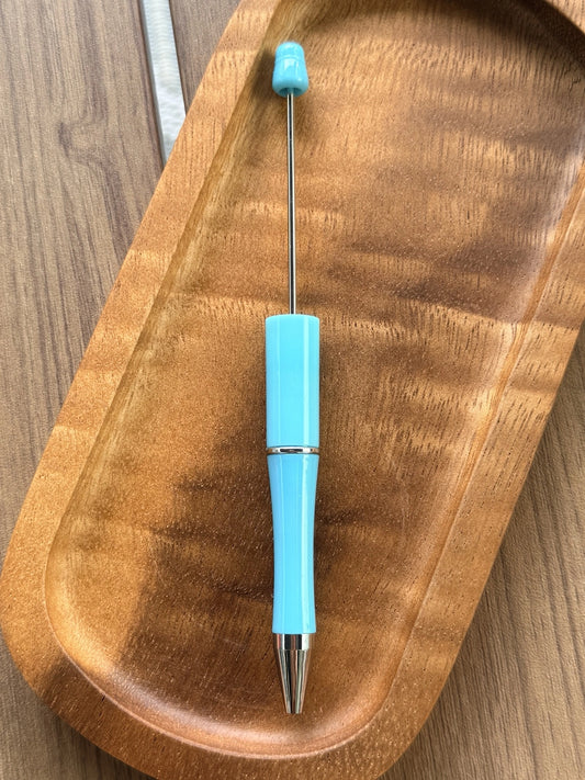 Coastal Breeze aqua blue beadable pen with refillable black ink and glossy finish for custom pen making projects.