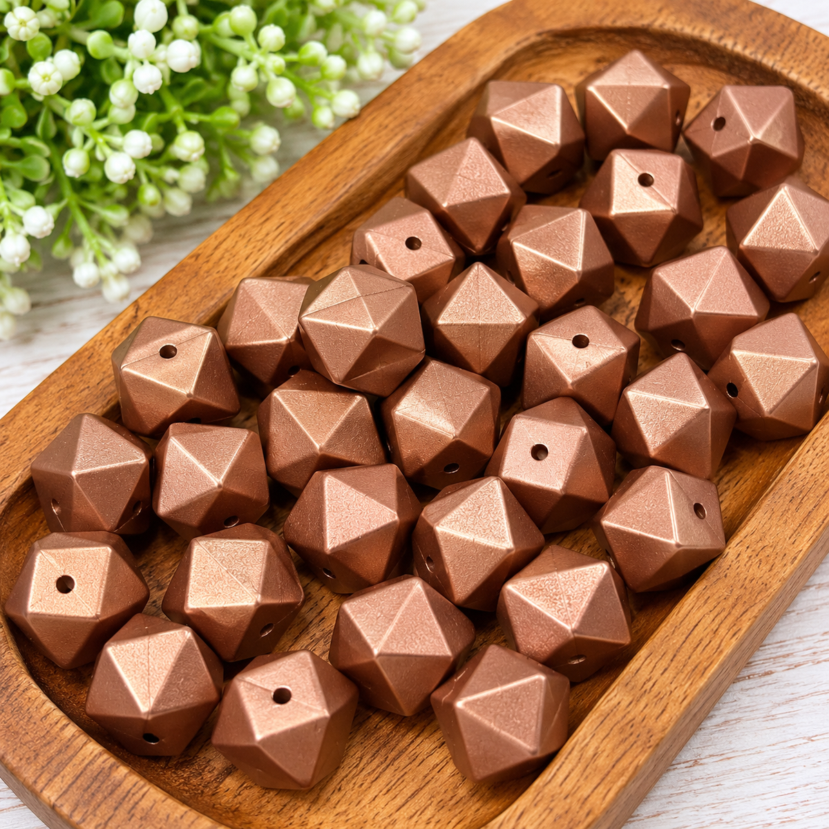 14mm metallic copper geometric silicone beads with faceted edges, sold in bags of 10