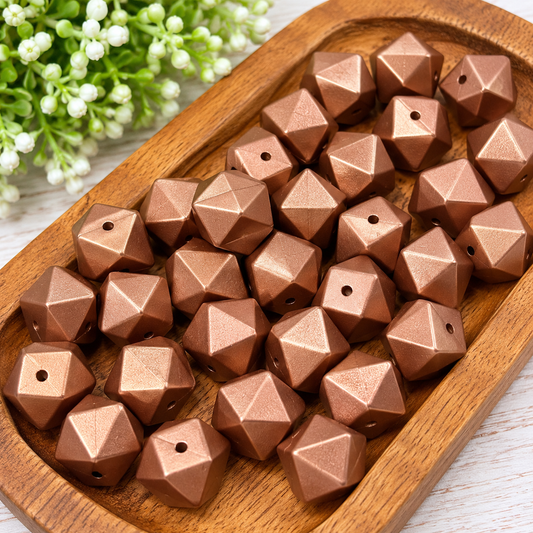 14mm metallic copper geometric silicone beads with faceted edges, sold in bags of 10