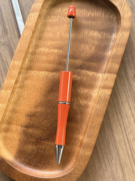 Coral Sunset Shimmer beadable pen with refillable black ink and vibrant coral-orange shimmer finish for custom pen making.