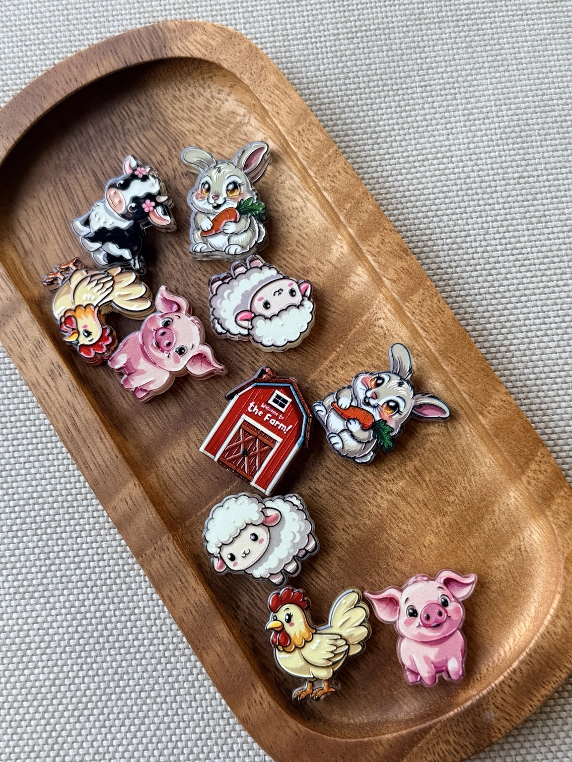 Assorted Barnyard Buddies acrylic focal bead mix featuring farm animals including bunny, pig, sheep, chicken, cow, and red barn designs. Mixed bag of 5 assorted acrylic focal beads for beaded pens, keychains, and DIY crafts.