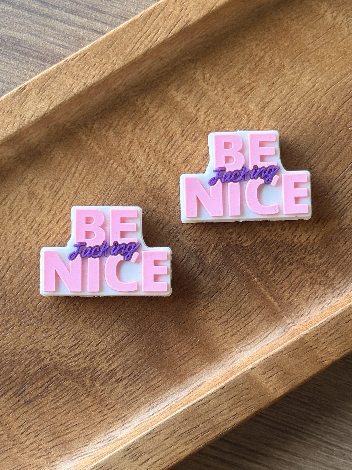 Pink and purple Be F*cking Nice silicone focal bead sold individually for beaded pens, keychains, wristlets, badge reels, lanyards and DIY craft projects.