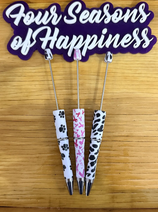 Beadable black ink pens with cow print and breast cancer awareness design for DIY crafting – Four Seasons of Happiness