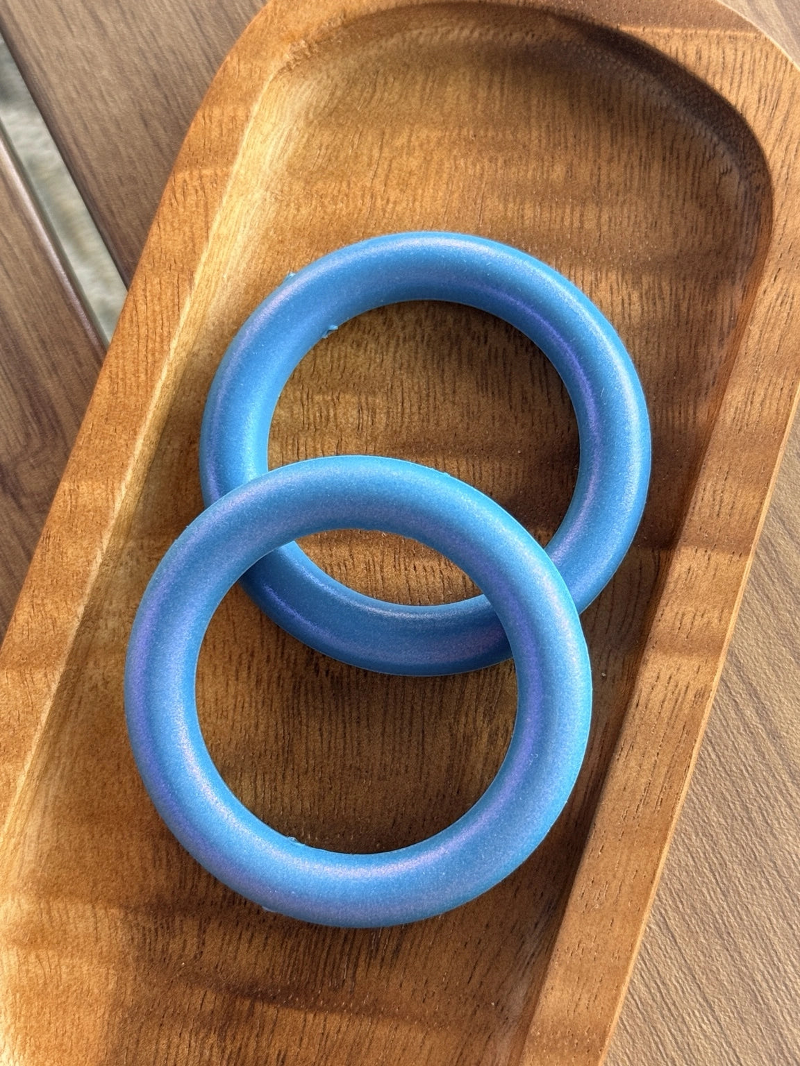 Blue Aura 65mm silicone ring bead with frosted blue and purple finish for DIY keychains, wristlets, teething accessories, and craft projects from Four Seasons of Happiness. 