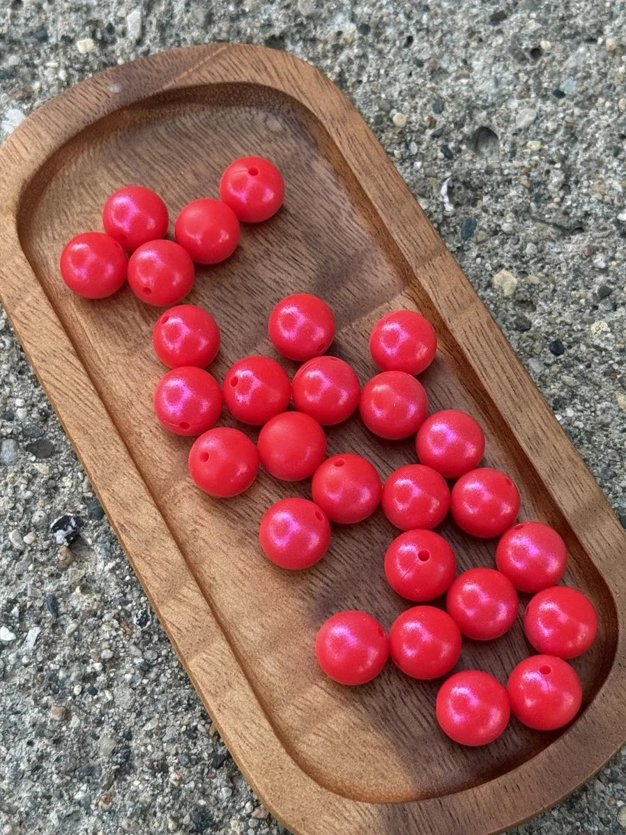 Premium FSOH Cherry Pop Opal 15mm round silicone beads with a vibrant frosted red finish for beaded pens, wristlets, keychains, badge reels, jewelry making, and DIY craft projects.