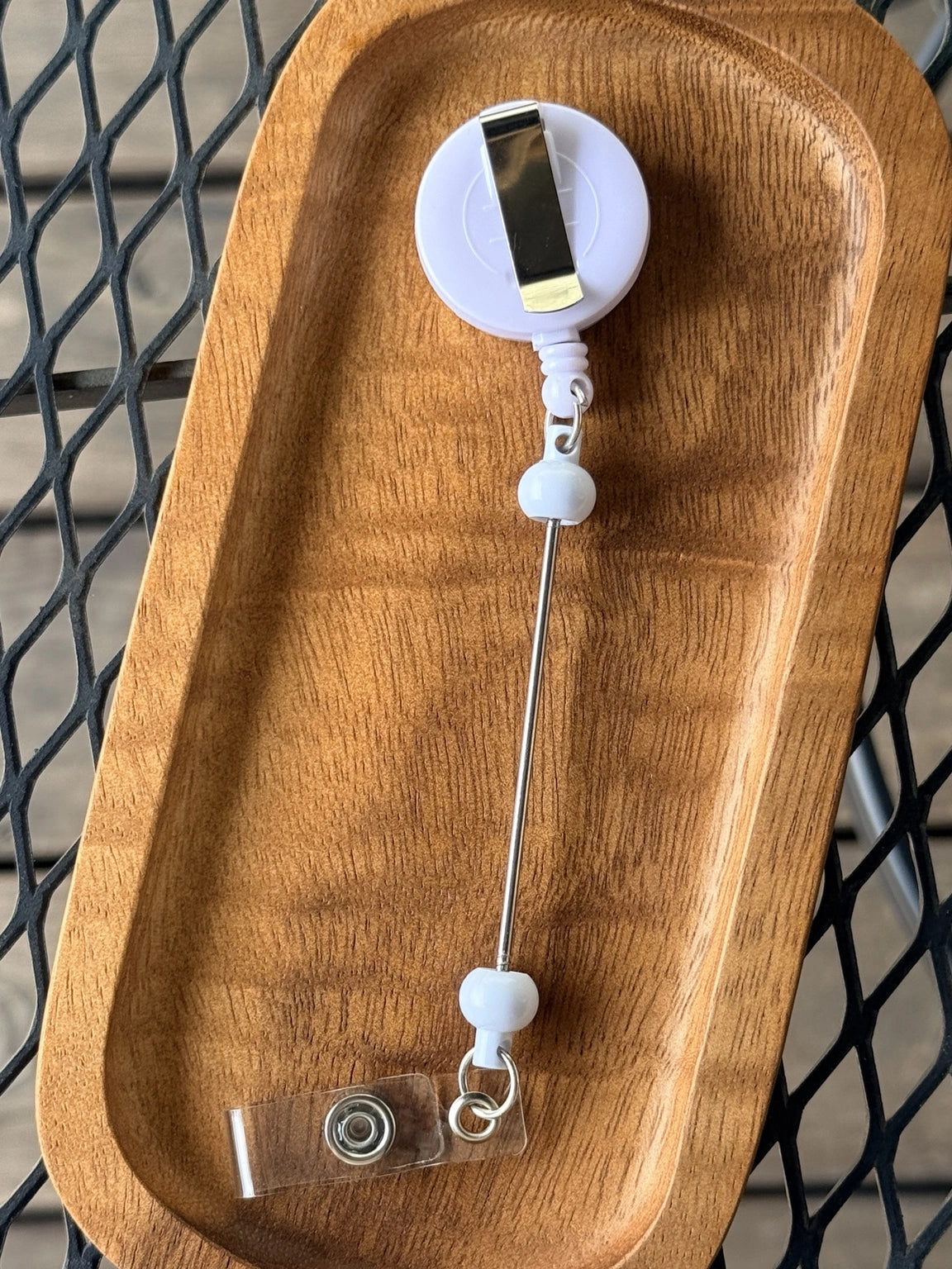 White beadable retractable badge reel with beadable bar and clear badge attachment ready for custom beaded designs