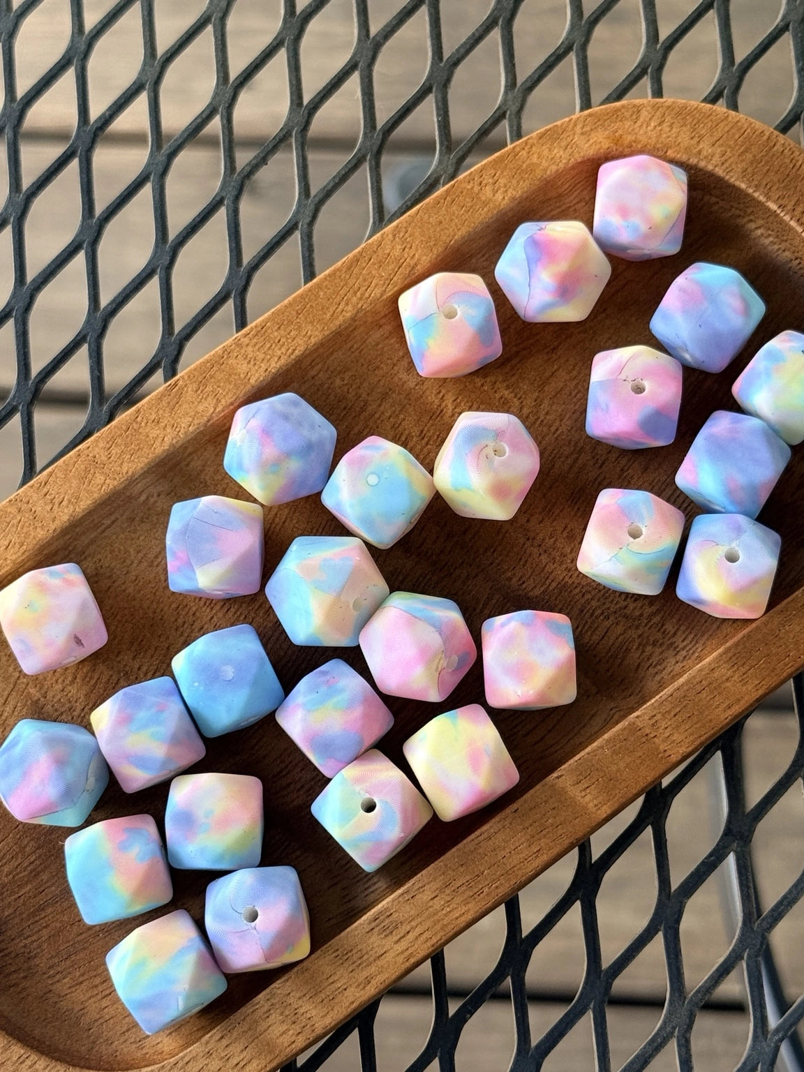 14mm pastel printed silicone hexagon beads in pink, blue, yellow, and lavender swirl pattern for beadable pens, keychains, jewelry making, and DIY crafts