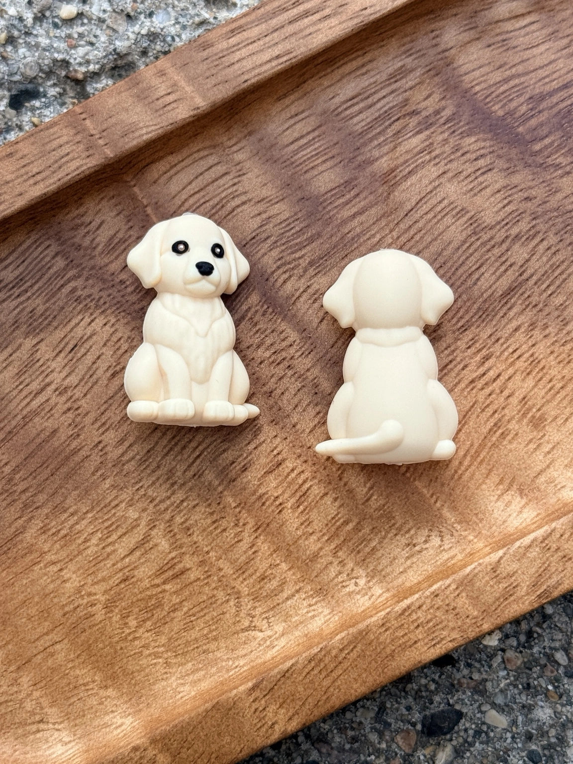 Cream puppy silicone focal bead featuring a detailed 3D dog design for DIY keychains, wristlets, badge reels, beadable pens, lanyards, and handmade craft projects.