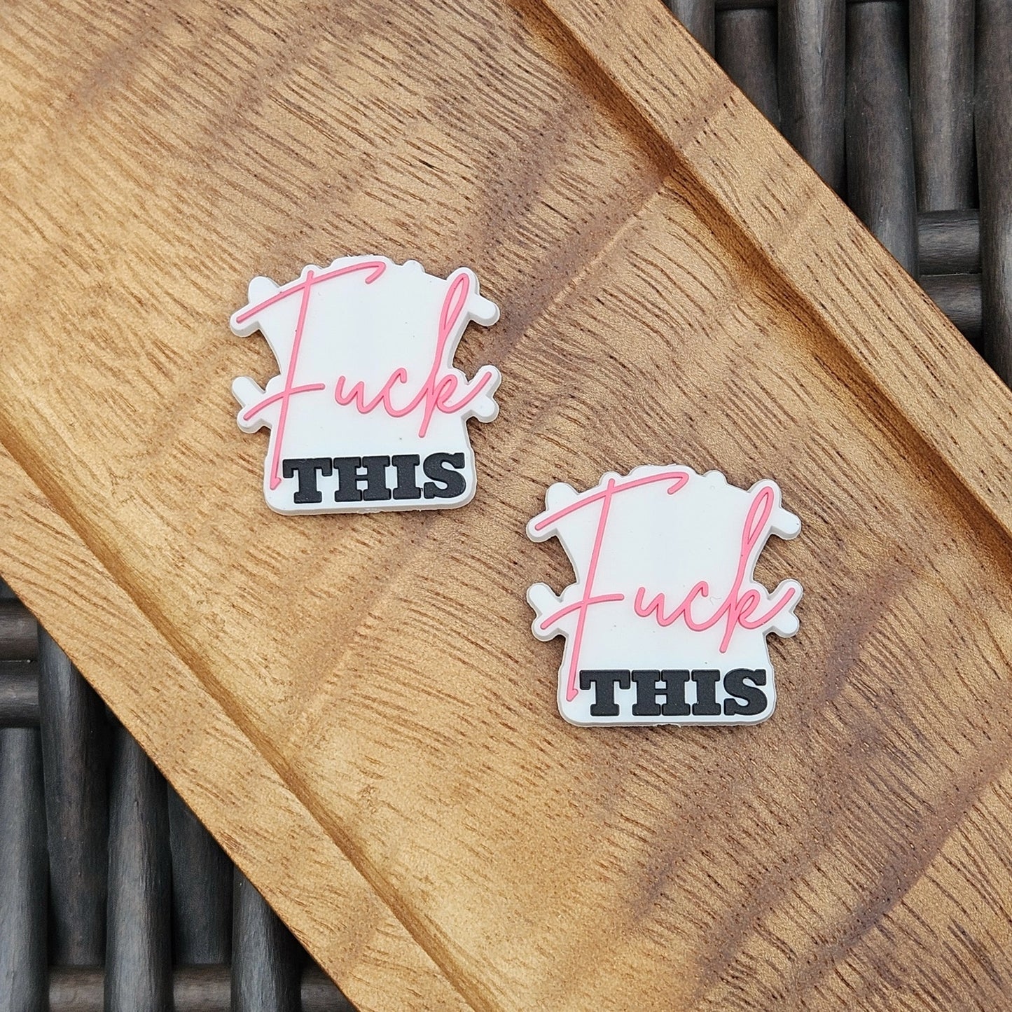 Layered silicone focal bead featuring the phrase “F This” in pink and black. Perfect for beadable pens, keychains, wristlets, badge reels, bookmarks, zipper pulls, lanyards, and DIY craft projects from Four Seasons of Happiness.