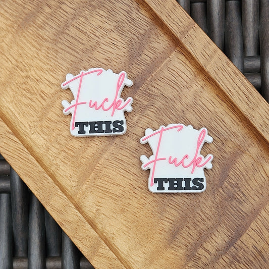 Layered silicone focal bead featuring the phrase “F This” in pink and black. Perfect for beadable pens, keychains, wristlets, badge reels, bookmarks, zipper pulls, lanyards, and DIY craft projects from Four Seasons of Happiness.