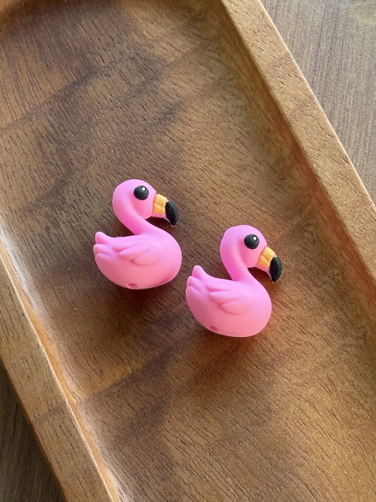 Pink 3D flamingo silicone focal bead with an orange and black beak for tropical beaded pens, keychains, wristlets, badge reels and summer DIY crafts.
