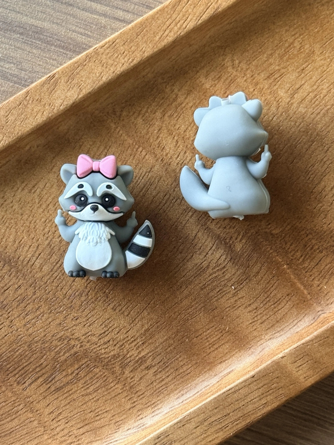 Fuccoon gray raccoon silicone focal bead with pink bow, striped tail and sassy gesture, sold individually for beaded pens, keychains, wristlets and DIY crafts.