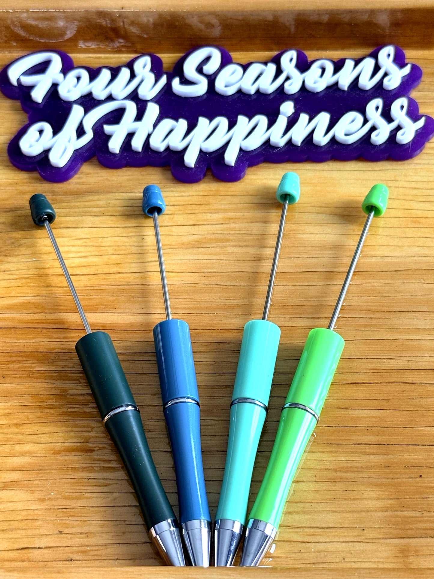 Green beadable pens from Four Seasons of Happiness for DIY beaded pens using silicone beads including teal, forest green, mint and bright green pen bases