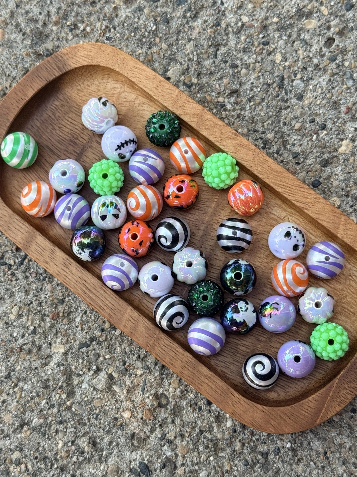 35-count FSOH Haunted Harvest 16mm acrylic Halloween scoop mix featuring assorted pumpkins, ghosts, spiders, striped beads, glitter beads, iridescent beads, and festive Halloween colors. Each mystery scoop is unique and perfect for beaded pens, keychains, wristlets, badge reels, jewelry making, and DIY Halloween crafts.