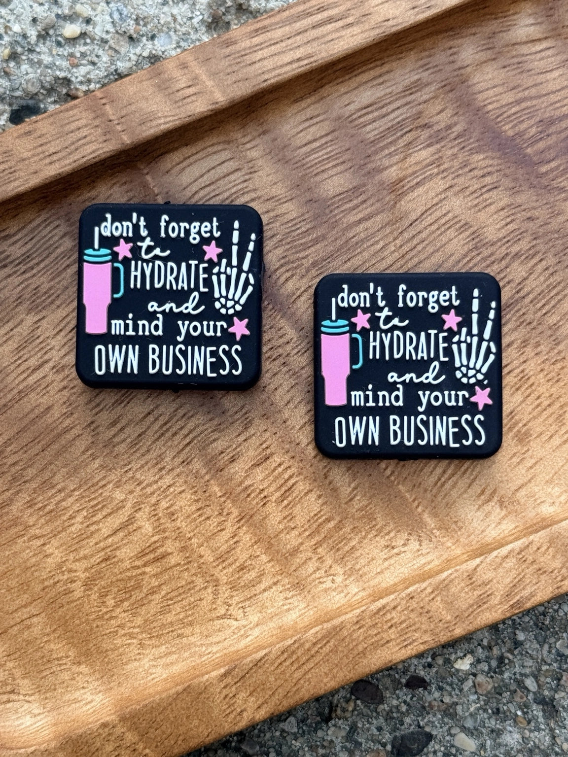 Hydrate and Mind Your Own Business silicone focal bead featuring a funny nurse-themed design for badge reels, beadable pens, keychains, wristlets, and handmade healthcare accessories.