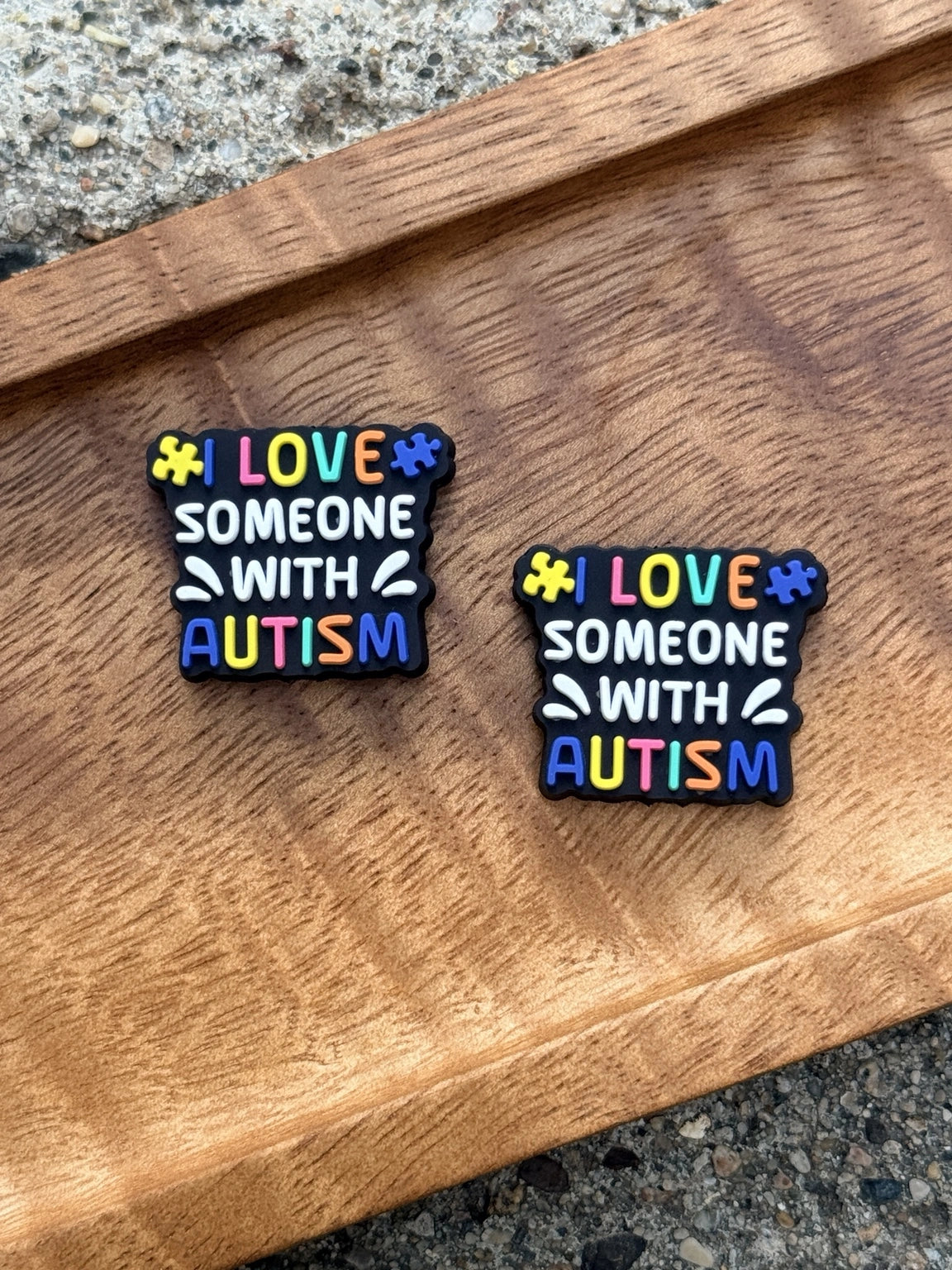 I Love Someone with Autism silicone focal bead featuring colorful autism awareness design and puzzle piece accents for DIY keychains, wristlets, badge reels, beadable pens, and awareness gifts.