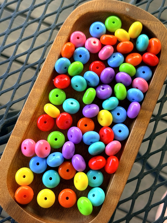 Bright mixed color 14mm liquid silicone abacus spacer beads in rainbow colors for beadable pens, wristlets, and DIY jewelry crafts