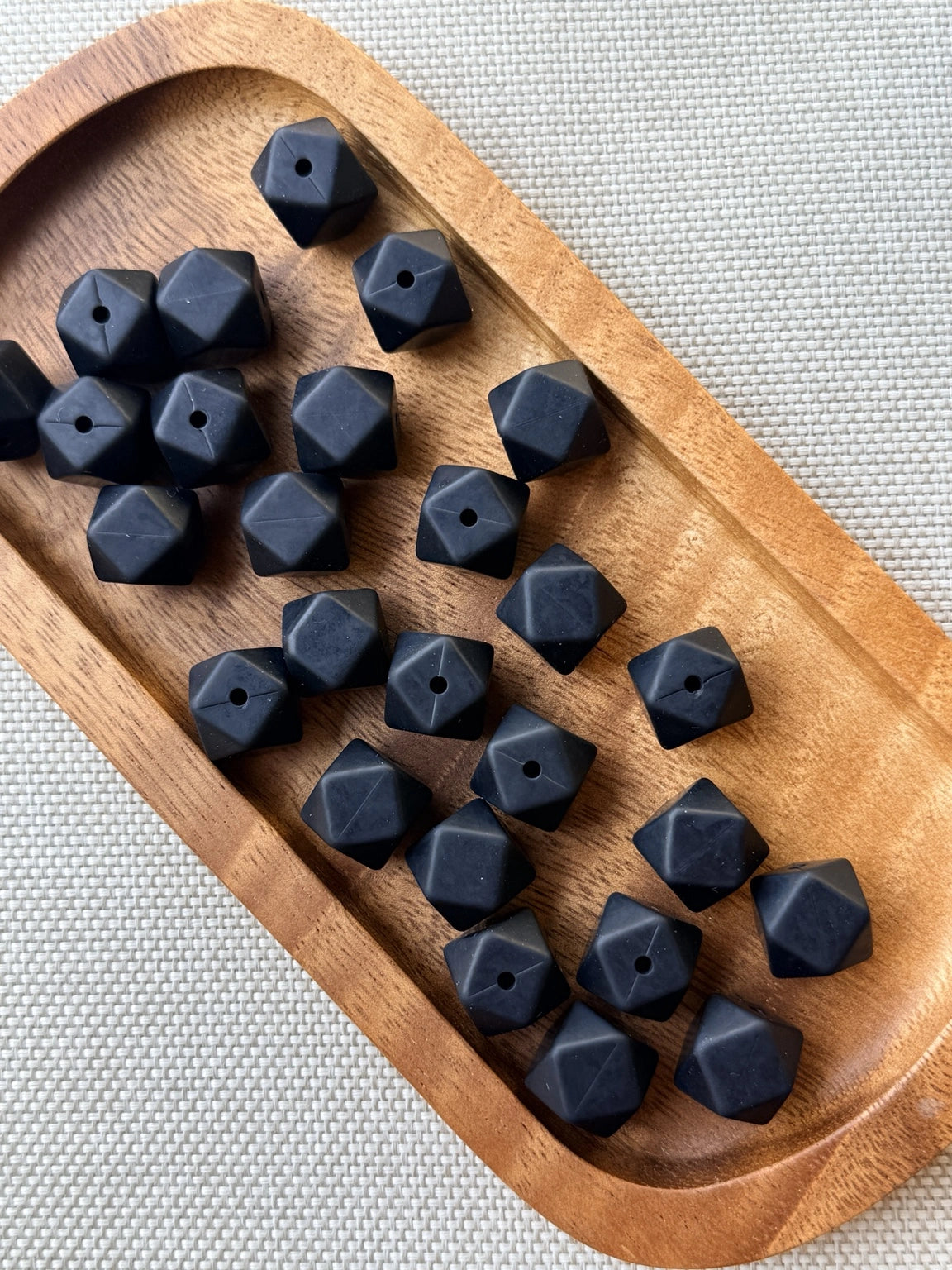 Midnight Onyx matte black 14mm silicone hexagon beads with a faceted geometric design. Premium silicone craft beads available in 5 or 10 count bags for beaded pens, keychains, wristlets, badge reels, and DIY projects.