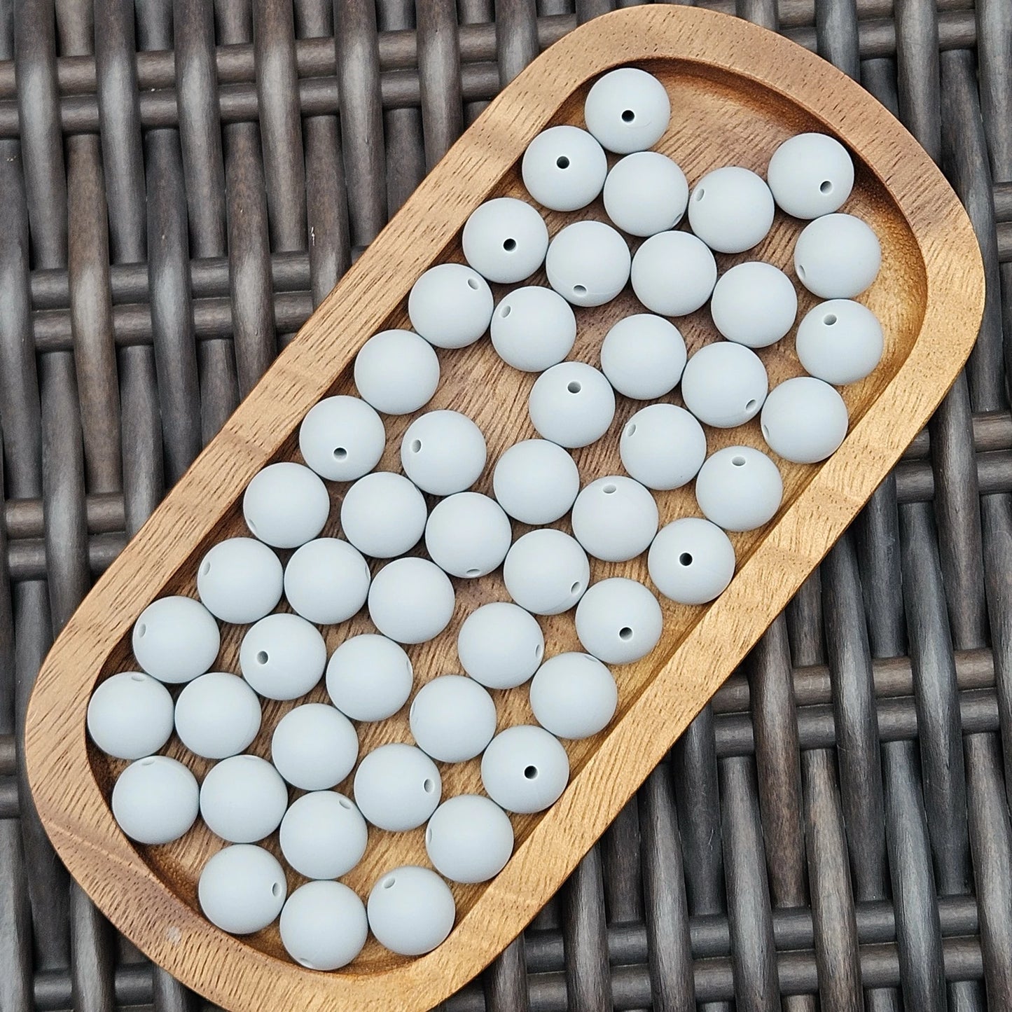 Morning Mist 15mm premium light gray silicone round beads by Four Seasons of Happiness. BPA-free silicone craft beads available in 1, 15, 30, 60, and 120 count options for beadable pens, wristlets, keychains, badge reels, bookmarks, zipper pulls, and DIY craft projects.