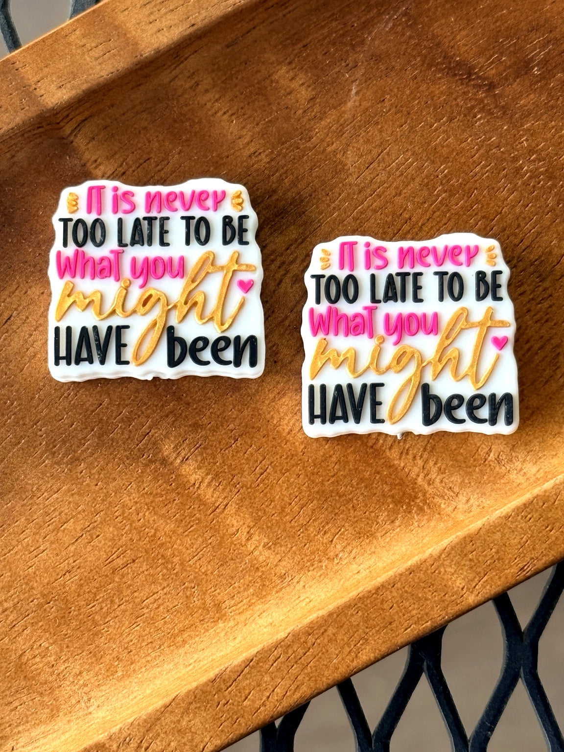Inspirational silicone focal bead featuring “It Is Never Too Late To Be What You Might Have Been” quote for beadable pens, keychains, badge reels, and DIY crafts
